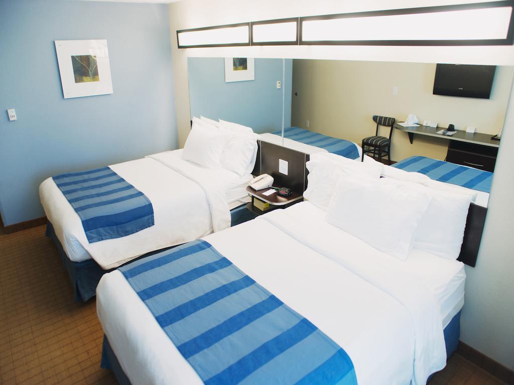 Three Rivers Inn & Suites Порт Артър Стая снимка