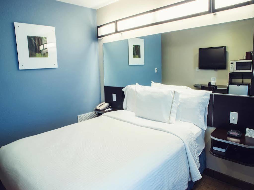 Three Rivers Inn & Suites Порт Артър Екстериор снимка